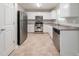 Well-lit kitchen with stainless steel appliances, ample cabinet space, and neutral countertops at 3568 Oakshire Se Way, Atlanta, GA 30354