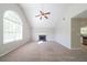 Spacious living room with vaulted ceilings, a fireplace, and abundant natural light at 3568 Oakshire Se Way, Atlanta, GA 30354