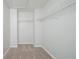Walk-in closet with neutral paint, carpet, and wire shelving for storage at 3568 Oakshire Se Way, Atlanta, GA 30354