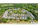 Aerial view showcases the well-maintained homes and lush greenery of the neighborhood at 4265 Prince Charles Dr, Duluth, GA 30097