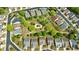 Aerial view showcases the community's layout with green spaces and well-maintained homes at 4265 Prince Charles Dr, Duluth, GA 30097