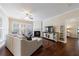 Cozy living room with hardwood floors, fireplace, and lots of natural light at 4265 Prince Charles Dr, Duluth, GA 30097