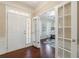 Welcoming office space with lots of light, French doors, and hardwood flooring at 4265 Prince Charles Dr, Duluth, GA 30097