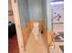 Bathroom area with toilet, safety bars and shower with shower door, perfect for accessibility at 1235 Jasmine Green Ct, Dacula, GA 30019