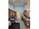 Stylish kitchen featuring stainless steel appliances, granite counters and abundant cabinet space at 1235 Jasmine Green Ct, Dacula, GA 30019