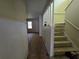 View of a hallway showing unfinished construction and staircase at 1846 Markone Nw St, Atlanta, GA 30318