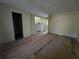 Spacious living room featuring plywood subfloor, ready for your custom flooring and design at 1846 Markone Nw St, Atlanta, GA 30318