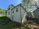 Back exterior view of home showcasing siding and backyard landscape at 1846 Markone Nw St, Atlanta, GA 30318