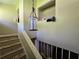 Stairwell featuring aged stairs, a hanging light fixture and a built-in wall alcove at 1846 Markone Nw St, Atlanta, GA 30318