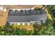 Aerial view of newly constructed townhomes with black roofs and green landscaping at 290 Silver Moon Drive # 111, Loganville, GA 30052