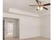 Open view of bedroom with large open doorways and dark ceiling fan at 290 Silver Moon Drive # 111, Loganville, GA 30052