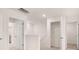 Upstairs hallway featuring an open walk-in closet and lots of natural light at 290 Silver Moon Drive # 111, Loganville, GA 30052