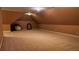Large finished attic space with neutral carpet, sloped ceilings, and plenty of open space for versatile use at 9390 Colonnade Trl, Johns Creek, GA 30022