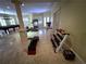 Spacious basement workout area with pool table, treadmill, weights and tile floors at 9390 Colonnade Trl, Johns Creek, GA 30022