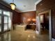 Large bathroom with a jacuzzi bathtub, shutters, and vanity area provides luxury and comfort at 9390 Colonnade Trl, Johns Creek, GA 30022