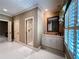 Bright bathroom with white tile, a walk-in shower, and a vanity with marble countertop at 9390 Colonnade Trl, Johns Creek, GA 30022
