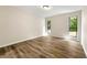 Bedroom with two windows and sleek modern floors at 1371 Branch Dr, Tucker, GA 30084