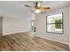 Bright, open living room featuring hardwood floors and an adjoining living area with fireplace at 1371 Branch Dr, Tucker, GA 30084