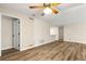 Open living room features sleek modern floors and neutral paint at 1371 Branch Dr, Tucker, GA 30084