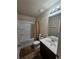 Well-lit bathroom featuring a tub-shower combo, toilet, and vanity with sink at 1750 Stone Meadow Rd, Lithonia, GA 30058