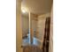 Bathroom featuring a shower/tub combo with a curtain and neutral tile floor at 1750 Stone Meadow Rd, Lithonia, GA 30058