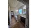 Bathroom with double sink vanity, garden tub with tile surround at 1750 Stone Meadow Rd, Lithonia, GA 30058