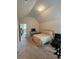 Bright bedroom with neutral carpet and a bed, bathed in natural light from the window at 1750 Stone Meadow Rd, Lithonia, GA 30058