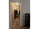 Walk-in closet with clothing racks, shelves, and carpet provides optimal storage at 1750 Stone Meadow Rd, Lithonia, GA 30058