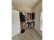 Walk-in closet with closet shelving and storage at 1750 Stone Meadow Rd, Lithonia, GA 30058