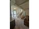 Inviting entryway featuring staircase, carpeted floors, and an open layout at 1750 Stone Meadow Rd, Lithonia, GA 30058