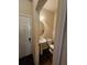Half bathroom featuring a sink and toilet and wood-look floor at 1750 Stone Meadow Rd, Lithonia, GA 30058