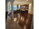 Beautiful kitchen with island, dark wood cabinets, stainless appliances and hardwood floors at 1750 Stone Meadow Rd, Lithonia, GA 30058