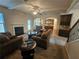 Spacious open-concept living room with fireplace connects to the kitchen for easy entertaining at 1750 Stone Meadow Rd, Lithonia, GA 30058
