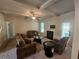 Cozy living room with fireplace, comfortable seating, and ample natural light at 1750 Stone Meadow Rd, Lithonia, GA 30058