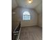 Loft space with neutral walls and flooring at 1750 Stone Meadow Rd, Lithonia, GA 30058