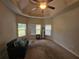 Large main bedroom suite with tray ceiling and ceiling fan at 1750 Stone Meadow Rd, Lithonia, GA 30058