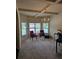 Bright office featuring coffered ceilings, carpeted floors, and large windows at 1750 Stone Meadow Rd, Lithonia, GA 30058