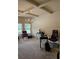 Bright office featuring coffered ceilings, carpeted floors, and large windows at 1750 Stone Meadow Rd, Lithonia, GA 30058