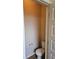 Powder room featuring a toilet, neutral paint, and tile floor at 1750 Stone Meadow Rd, Lithonia, GA 30058