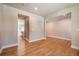 Open dining area offering wood floors, recessed lighting, and seamless flow to other spaces for easy living at 4082 Adler Cir, Buford, GA 30519
