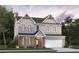 Charming two-story home boasts a modern exterior, complemented by lush landscaping, and a two-car garage at 4082 Adler Cir, Buford, GA 30519