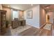 Bright office features hardwood floors, a large window, and neutral color palette at 4082 Adler Cir, Buford, GA 30519