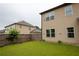 View of a well-maintained backyard featuring a green lawn and privacy fence at 552 Warrenton Run Dr, Sugar Hill, GA 30518