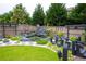 Landscaped backyard with elegant water feature, bridge, and lush greenery for a peaceful retreat at 552 Warrenton Run Dr, Sugar Hill, GA 30518