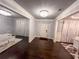 Entryway featuring dark wood flooring and elegant chandelier lighting at 552 Warrenton Run Dr, Sugar Hill, GA 30518