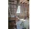 Basement stairs and window in unfinished space, ready for finishing and customization to your preferences at 110 Dahlia Nw Ave, Atlanta, GA 30314