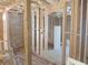Unfinished basement featuring framing and block walls, ready for customization to create additional living space at 110 Dahlia Nw Ave, Atlanta, GA 30314