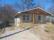View of the house during renovation, showing the front with the porch framing in place at 110 Dahlia Nw Ave, Atlanta, GA 30314