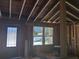 Interior shot with new door and window in home renovation at 110 Dahlia Nw Ave, Atlanta, GA 30314