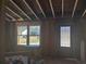 Interior view of new windows and doorway in home renovation project at 110 Dahlia Nw Ave, Atlanta, GA 30314
